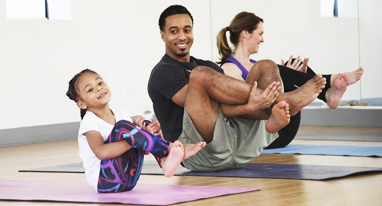 Family exercising together